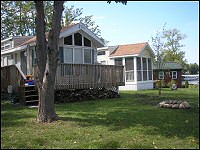 Photo of two lake cottages